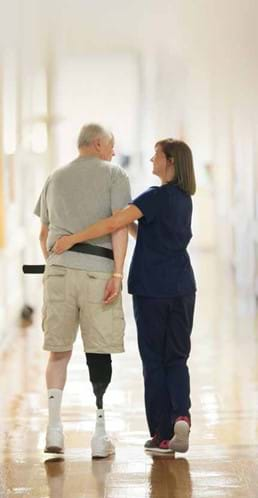 therapist and patient doing physical therapy