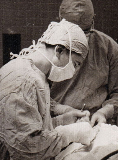 Young Dr. McNally in surgery
