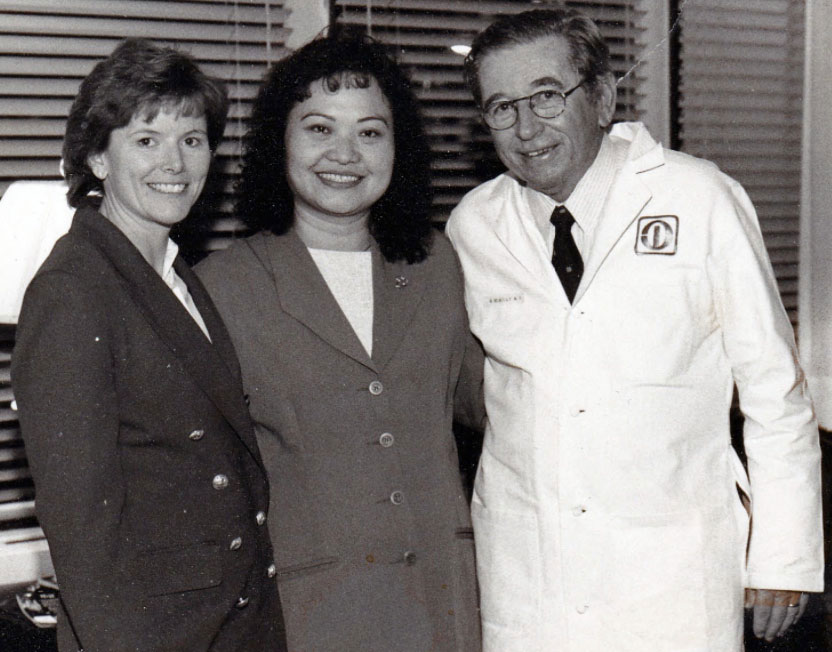 Dr. R. McNally with daughter and patient