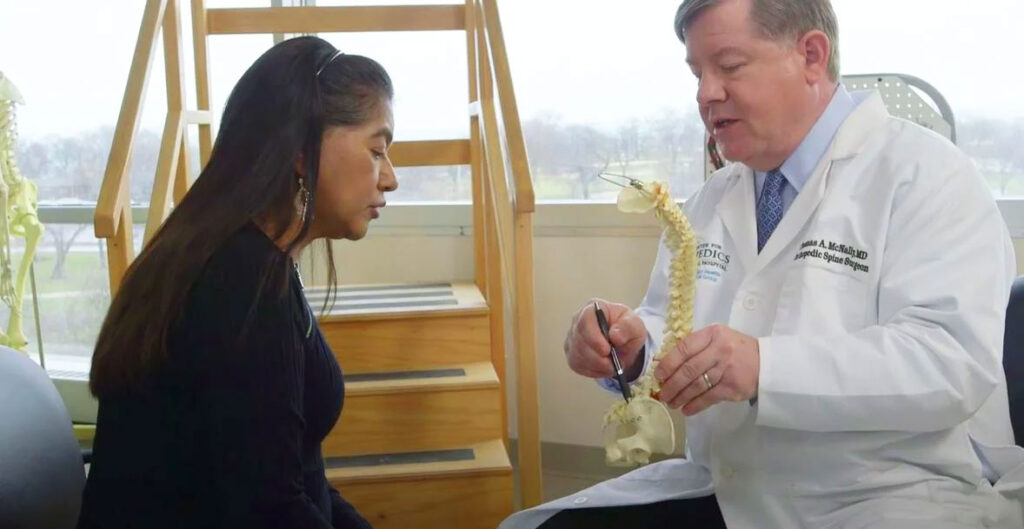 Dr. McNally with scoliosis patient