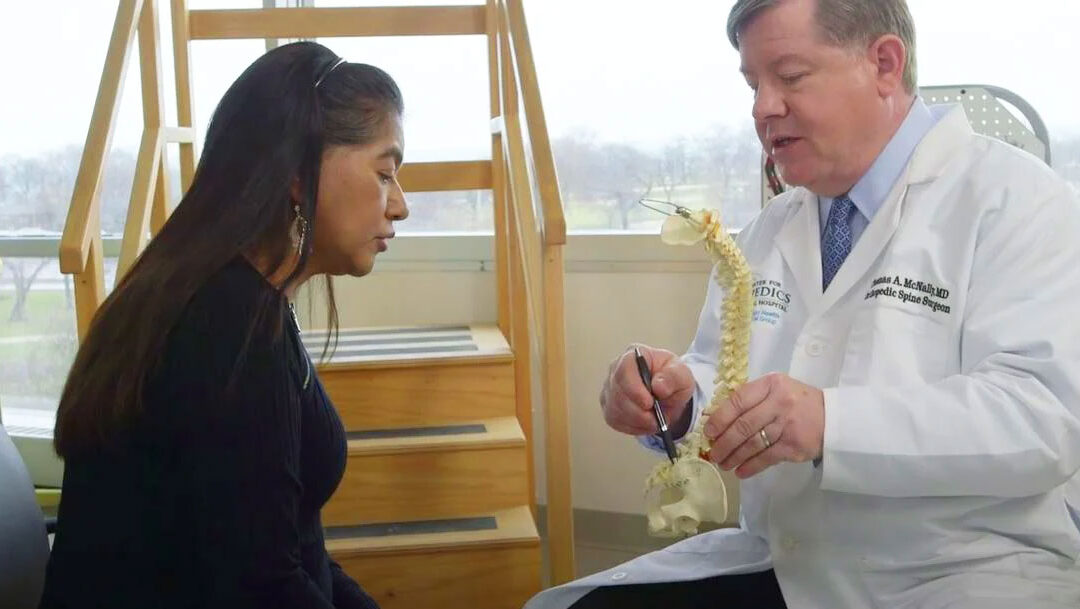 Dr. McNally with scoliosis patient