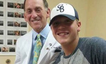 Dr. Wolin with young baseball player