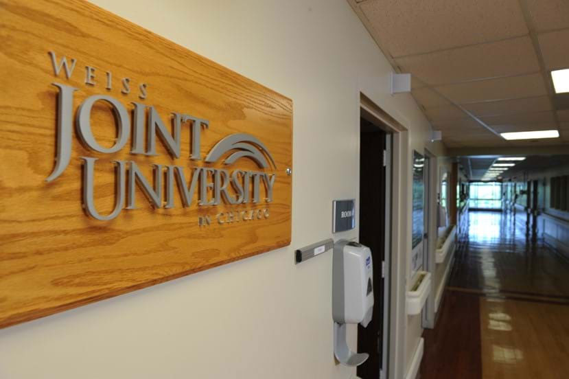 Joint University sign at Weiss