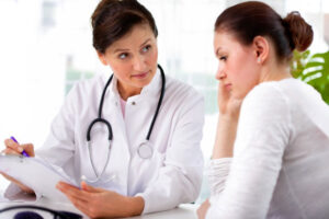 patient consults with doctor