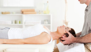 patient with chiropractor